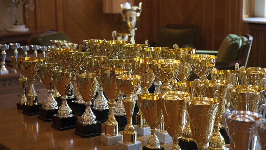cups and awards on a table