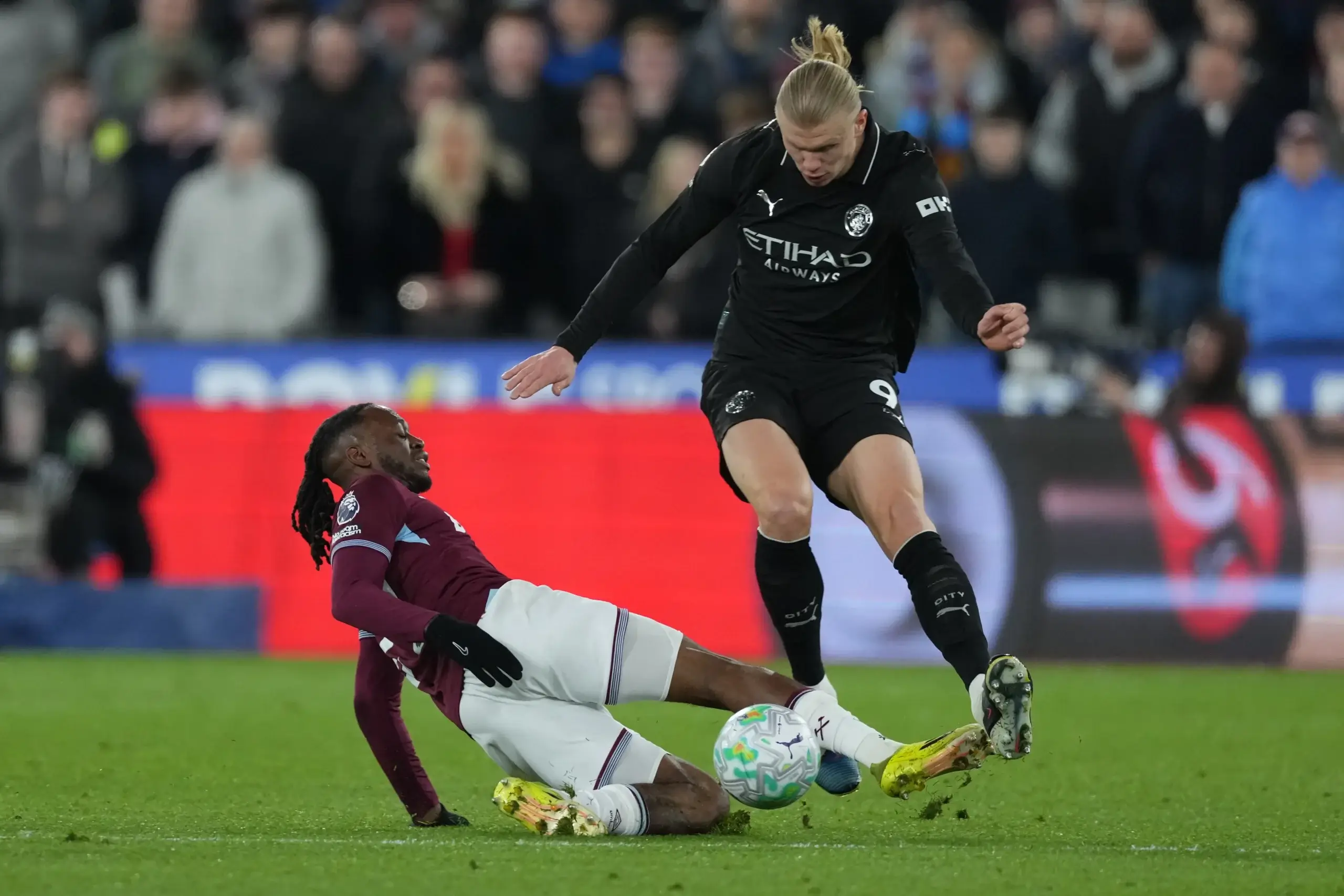 Аарън Уан-Бисака и Ерлинг Халанд